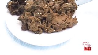 Brown haired japanese shits on white plate