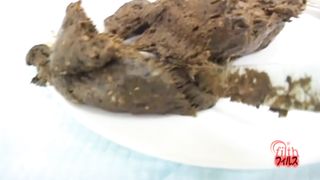 Brown haired japanese shits on white plate