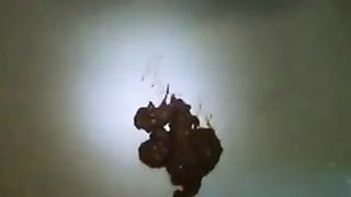 Fingering pussy while shitting in white panties