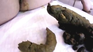 Masked brunette fingering pussy