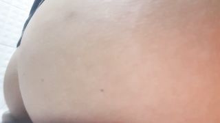 Undressed to poop over toilet