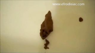 Playing with her pussy while pooping slowly for us