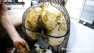 Hot babe masturbates with fresh crap