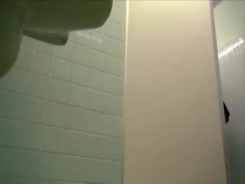 Asian girl desperate to poop on bathroom floor