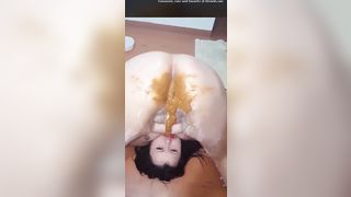Shitting a lot on her own face
