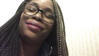 Black girl using a public bathroom