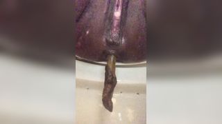 Black babe pooping slowly