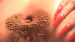 Spreading butt cheeks wide opened to poop