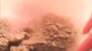 Spreading butt cheeks wide opened to poop