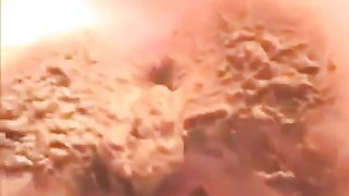 Spreading butt cheeks wide opened to poop