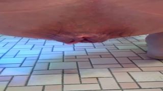 Hairy babe shits in close up