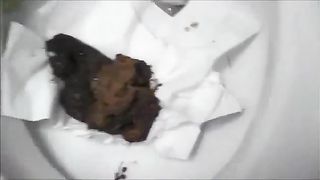 Pierced milf pooping