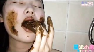 Eating her own poop slowly