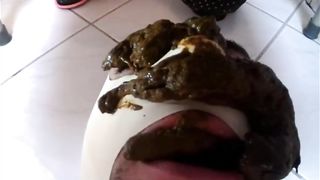 Lots of shit on slave's face