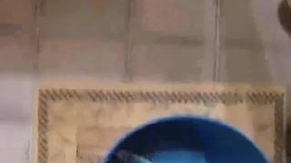 Milf shits a lot in a bucket