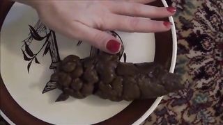 Huge turd on white plate