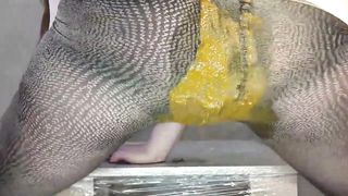 Dark haired teen smears poop