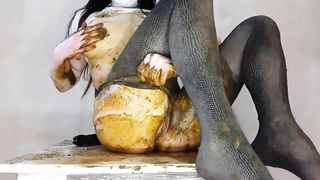 Dark haired teen smears poop