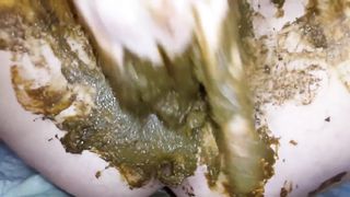 Stuffed her pussy with shit before masturbating