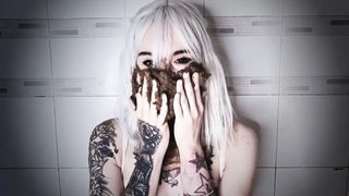 Smearing poop on her sexy face