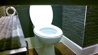 Spying on his sexy wife pooping