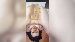 Nasty milf shits on own face