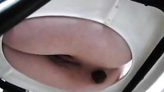 Huge turd from shaved teen