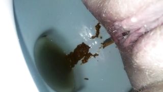 Close up of his wife shitting lots