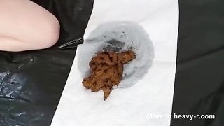 Brown shit on her knees