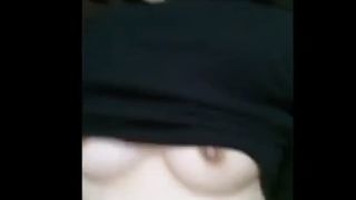 Dark haired teen shits on her knees