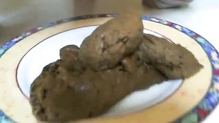 Lots of shit on white plate