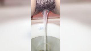 Hairy wife shitting and peeing