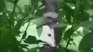 Two girls poop together in nature