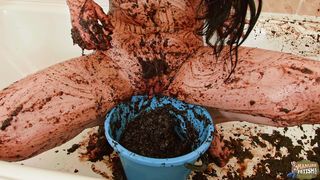 Russian beauty play with a bucket of cowshit and masturbates
