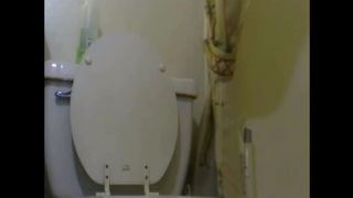 Hairy milf struggles to poop