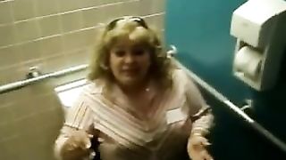 Chubby blonde shits over toilet