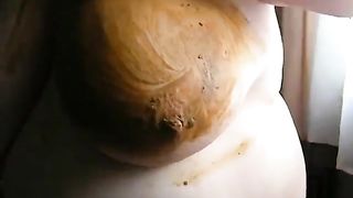 Smearing poop on big tits