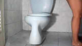 She's pooping in reverse position