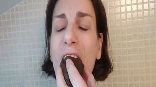 Smearing shit on face and tits