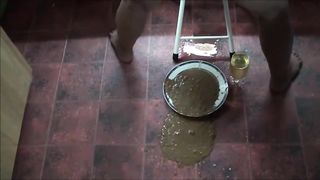 Mature lady shit a big load of diarrhea and piss on glass