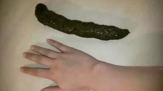 Blonde girl shitting on a table