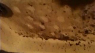 Woman shitting a very liquid diarrhea in the shower