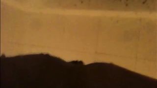 Woman shitting a very liquid diarrhea in the shower