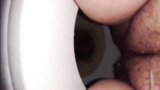 Hairy woman shit and piss on the toilet