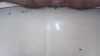 Hairy granny shitting closeup