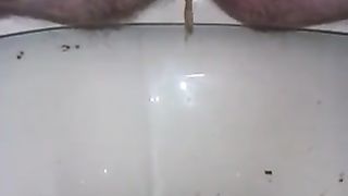 Hairy granny shitting closeup