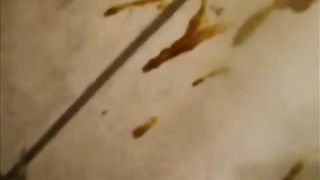 Fat woman shitting diarrhea on the floor