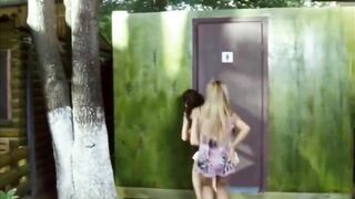 Poor farting girls gets stink bombed in an outhouse