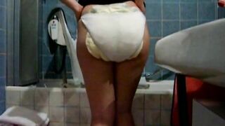 Amateur girl making the messiest and smelliest diaper