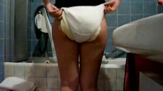 Amateur girl making the messiest and smelliest diaper